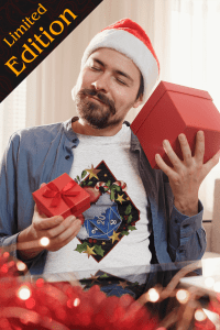 A man in a Santa hat holds gift boxes while wearing a festive D&D-themed t-shirt featuring a D20 die.